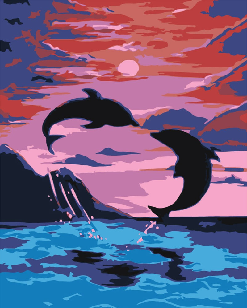 Dolphins at sunset
